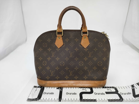 LOUIS VUITTON Monogram Alma Handbag