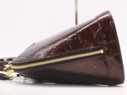 LOUIS VUITTON M91611 Vernis Alma PM Amaranth Handbag with Cadena, 2 Keys, and Cloche