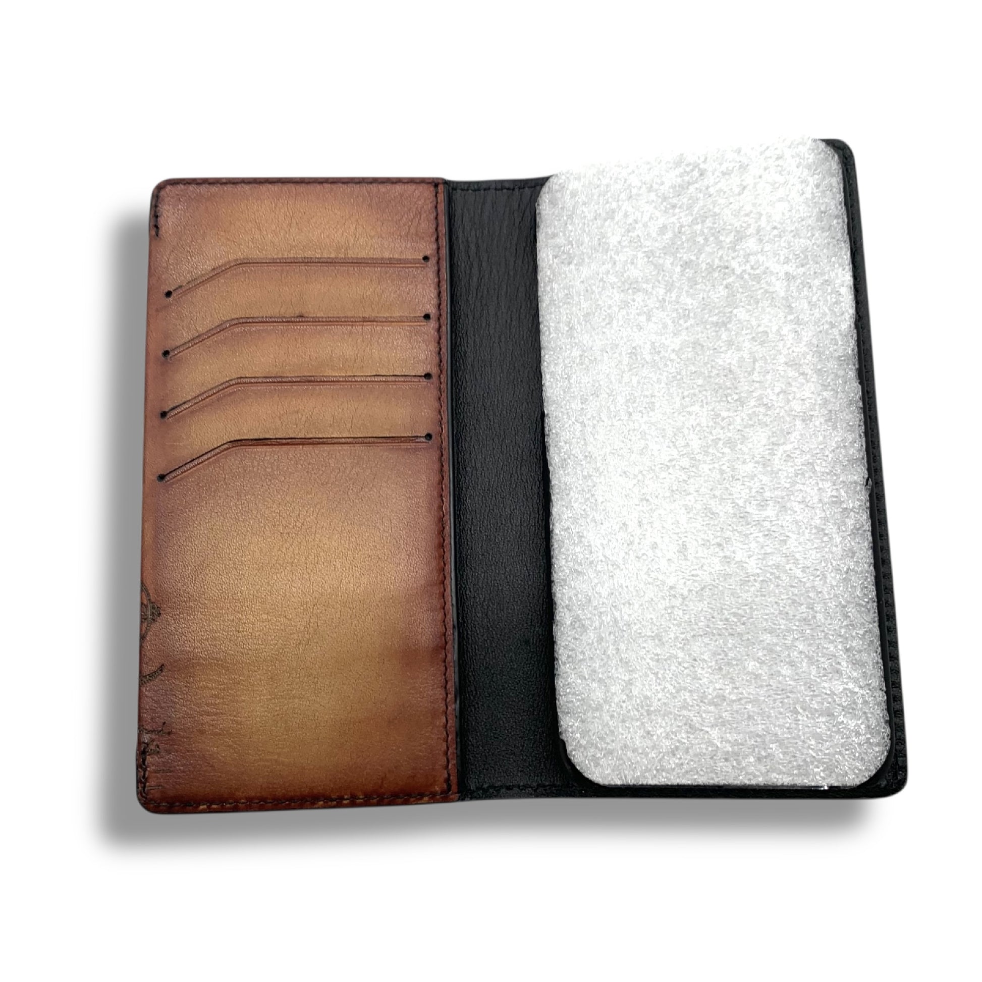 Berluti smartphone case with box and other accessories