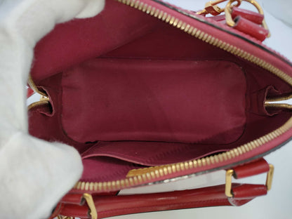 LOUIS VUITTON Vernis Alma BB Handbag