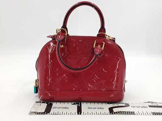 LOUIS VUITTON Vernis Alma BB Handbag