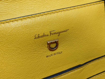 Salvatore Ferragamo Gancini ID - Salvatore Ferragamo Leather Trifolio Top Handle Yellow Handbag 25cm GHW
