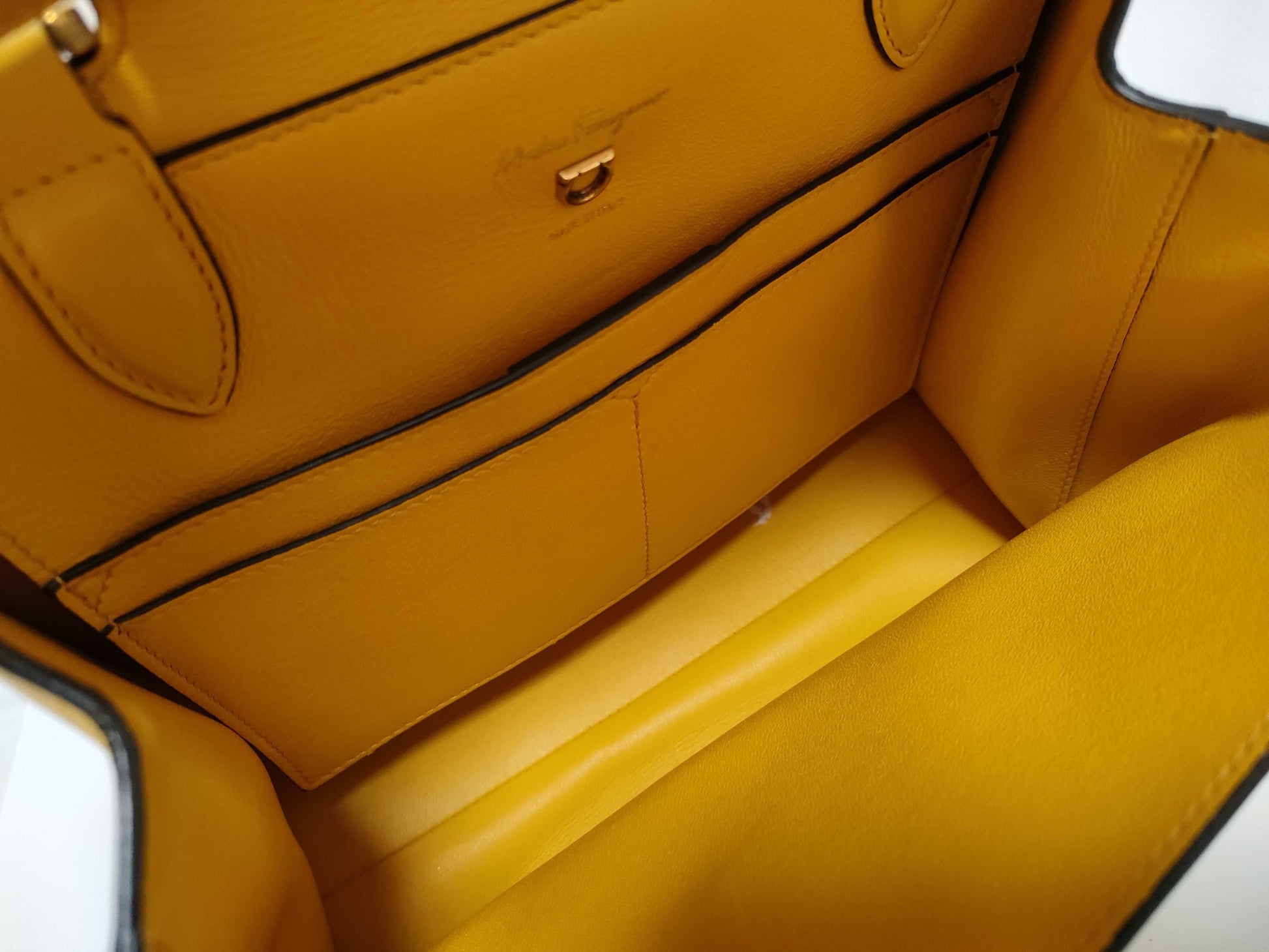 Salvatore Ferragamo Gancini ID - Salvatore Ferragamo Leather Trifolio Top Handle Yellow Handbag 25cm GHW
