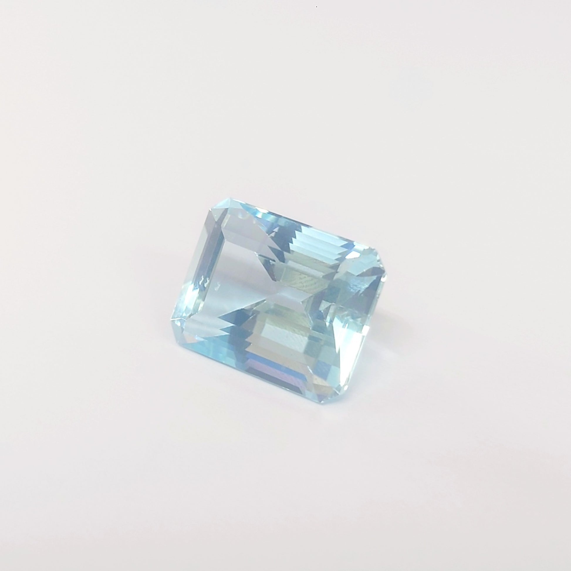 AQ 12.322ct, approx. 15.77 x 12.24 x 10.07mm, loose colored stone.