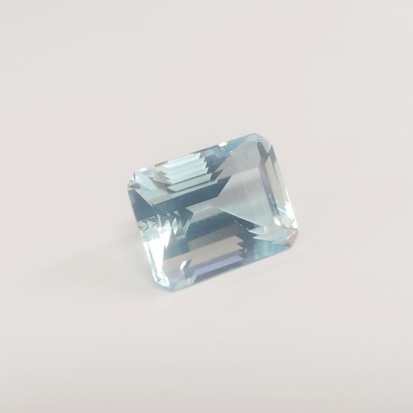 AQ 12.322ct, approx. 15.77 x 12.24 x 10.07mm, loose colored stone.