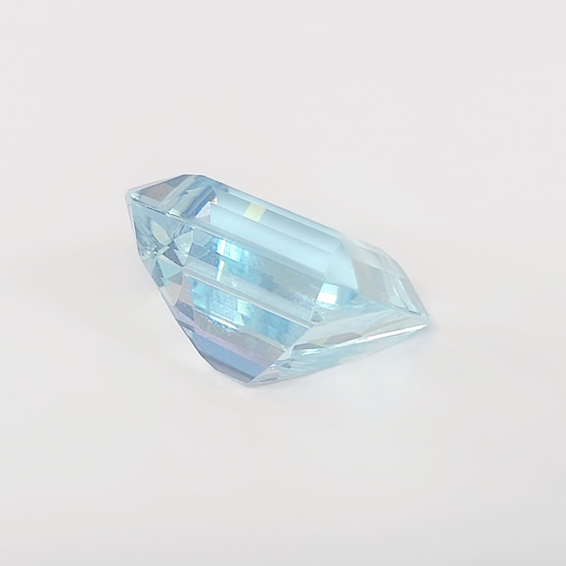 AQ 12.322ct, approx. 15.77 x 12.24 x 10.07mm, loose colored stone.