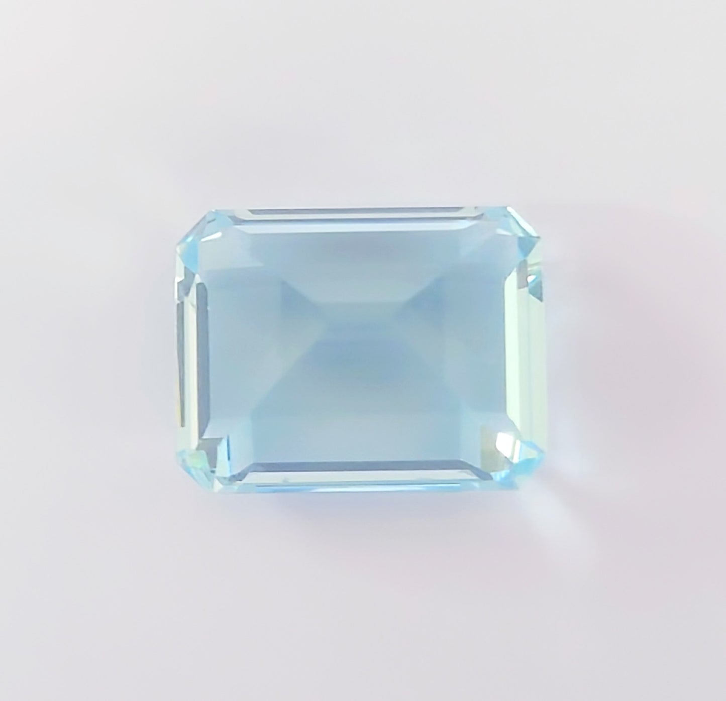AQ 12.322ct, approx. 15.77 x 12.24 x 10.07mm, loose colored stone.