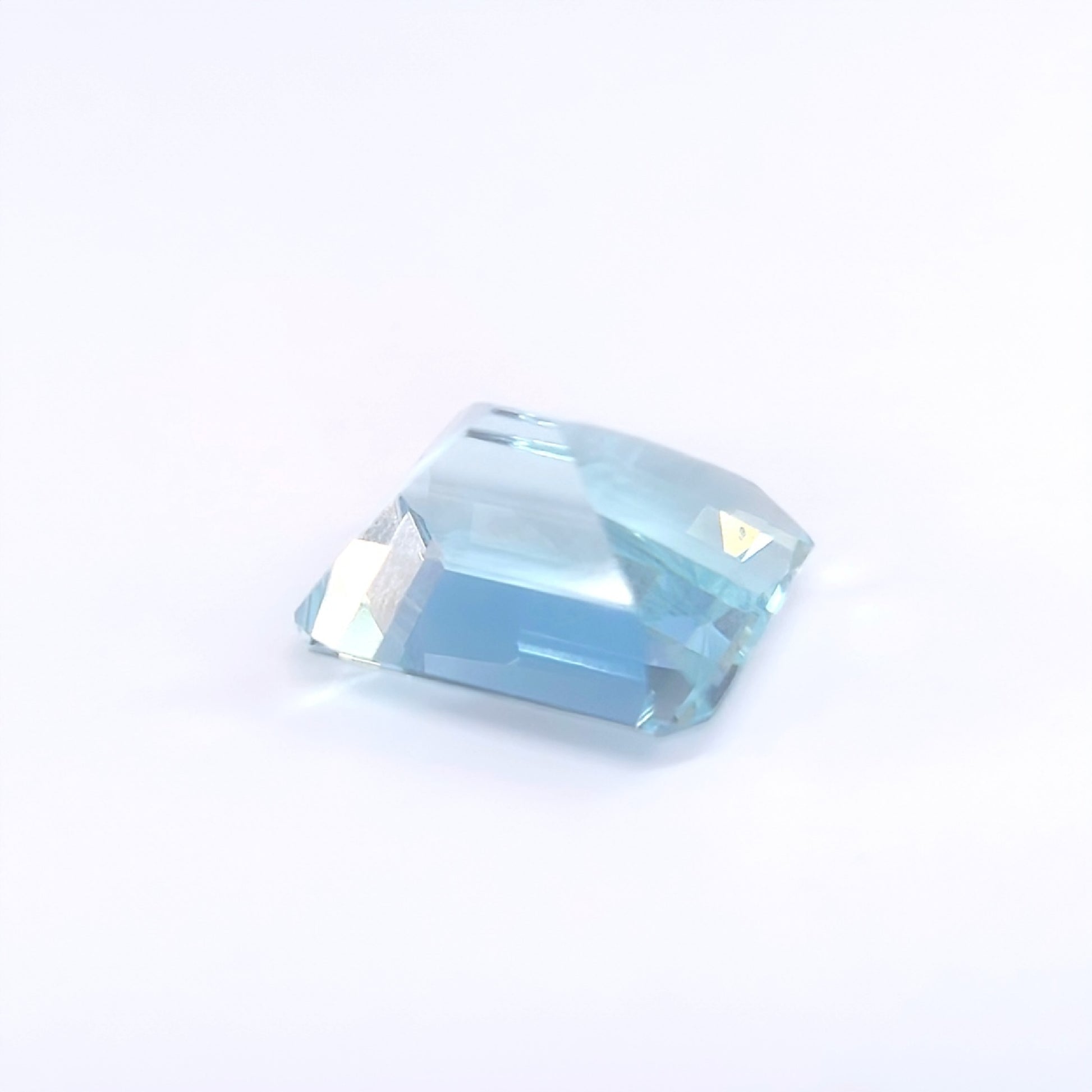 AQ 12.322ct, approx. 15.77 x 12.24 x 10.07mm, loose colored stone.