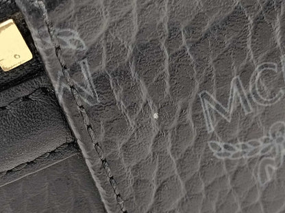 MCM Visetos Vanity Case, 2-Way Handbag, Black with Gold Hardware, PVC Leather, and Leather.