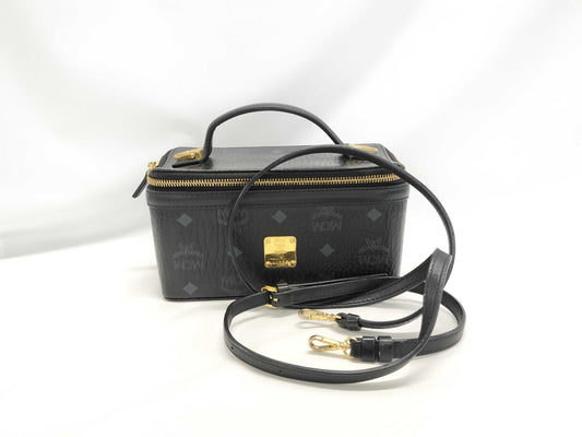 MCM Visetos Vanity Case, 2-Way Handbag, Black with Gold Hardware, PVC Leather, and Leather.