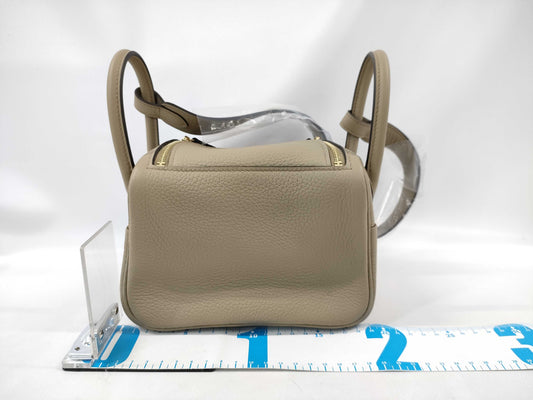 HERMES Lindy Mini Shoulder Bag in Taurillon Clemence Leather, Beige Marfa Leather, Gold Hardware, GP W Stamp