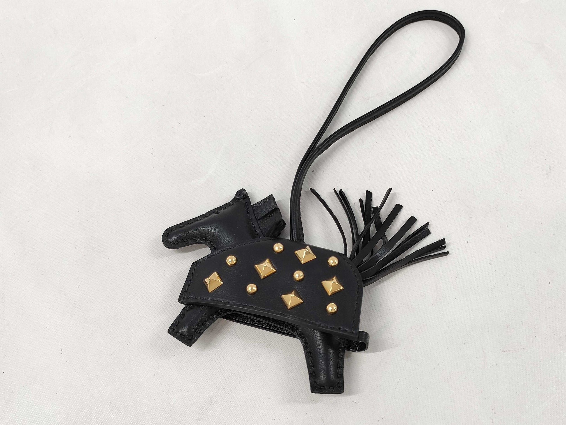 HERMES Rodeo PM Charm, Robeo Cool Rock Studs, So Black Gold Hardware, K Stamped Charm