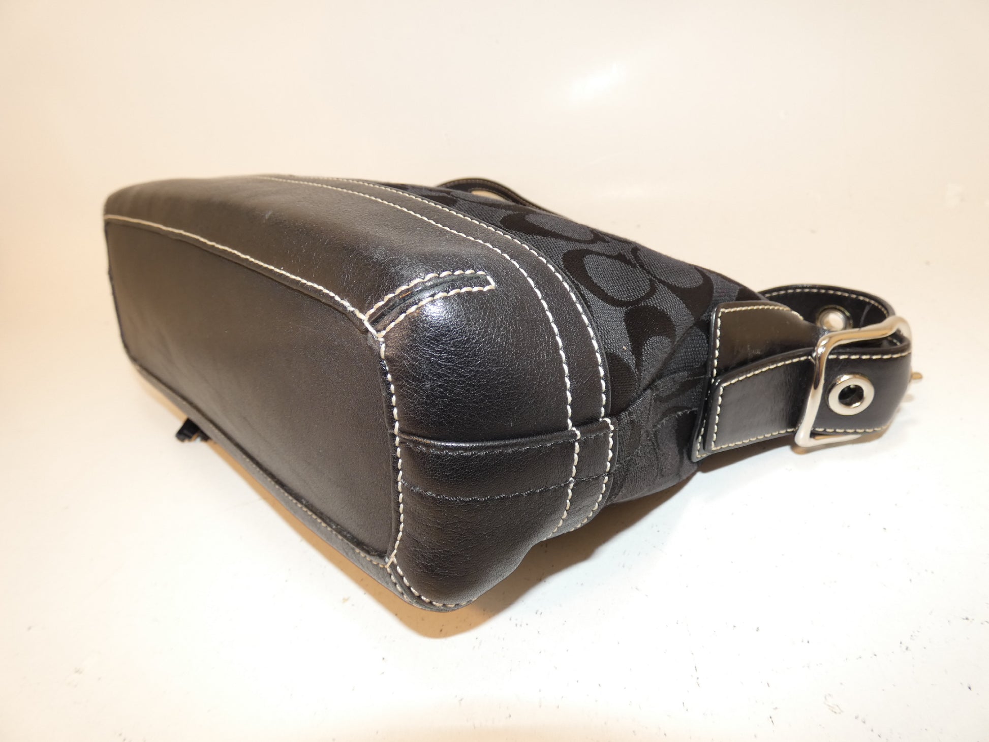 COACH Signature Canvas and Leather Black Tassel Pull One-Hand Handbag