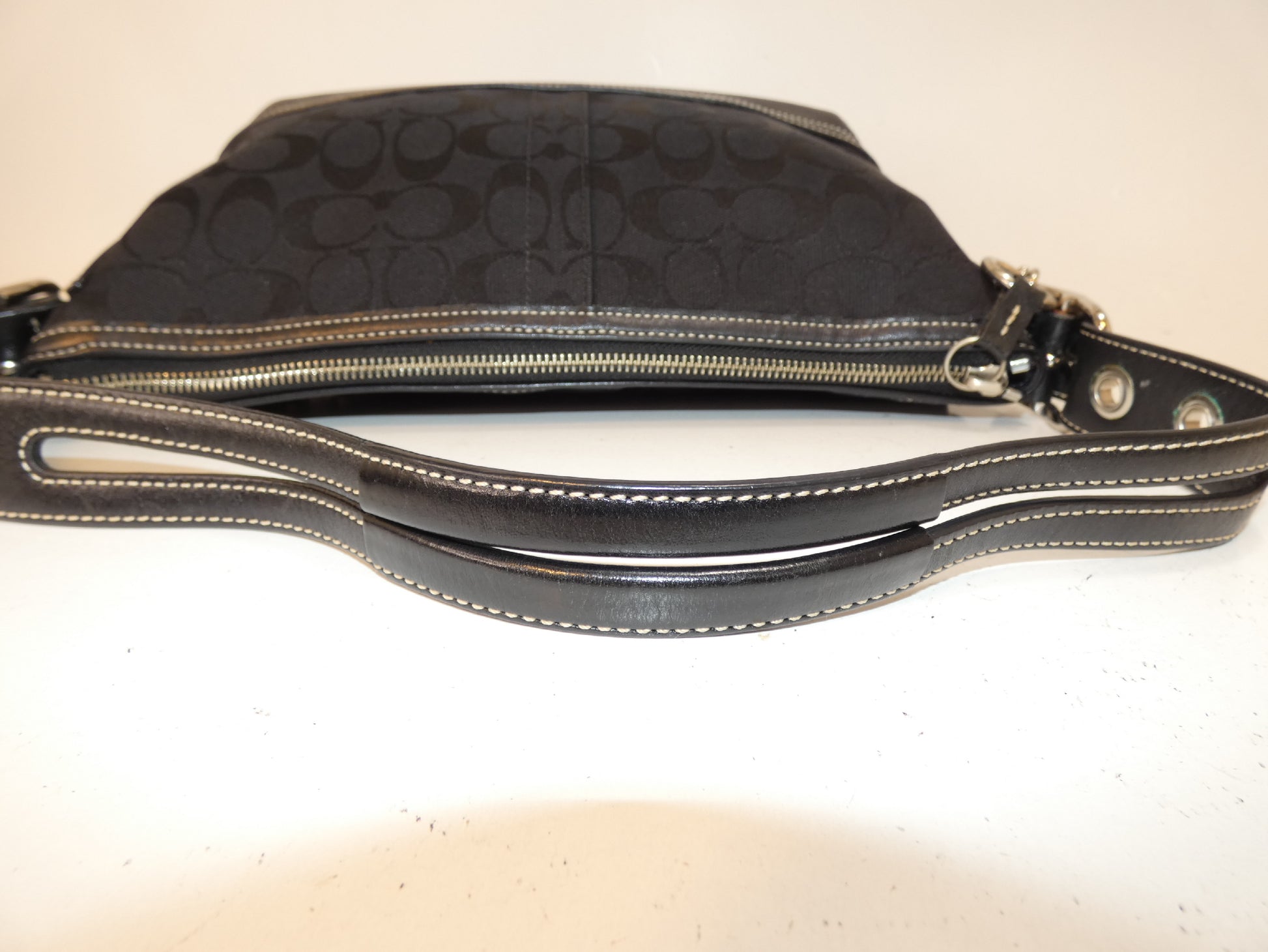COACH Signature Canvas and Leather Black Tassel Pull One-Hand Handbag
