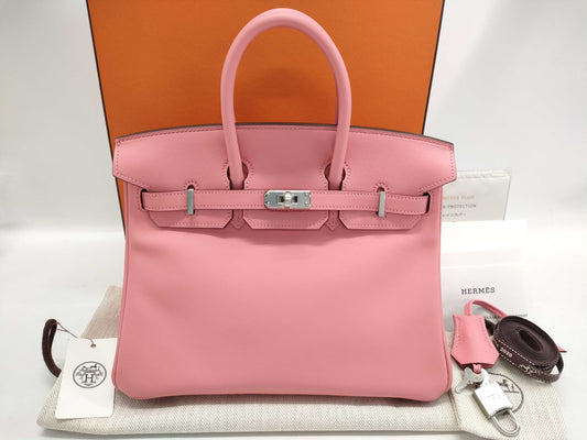 HERMES Birkin 25 in Swift leather with Rose Azalee finish and sterling silver hardware, featuring a "Y" stamp.
