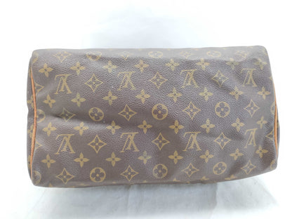 LOUIS VUITTON Monogram Louis Vuitton Speedy 30 Boston Bag