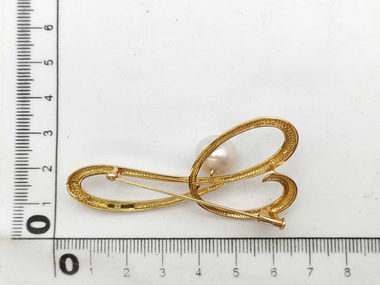 Pearl diameter: approx. 10.7mm, 18K gold, 9.8g, brooch 