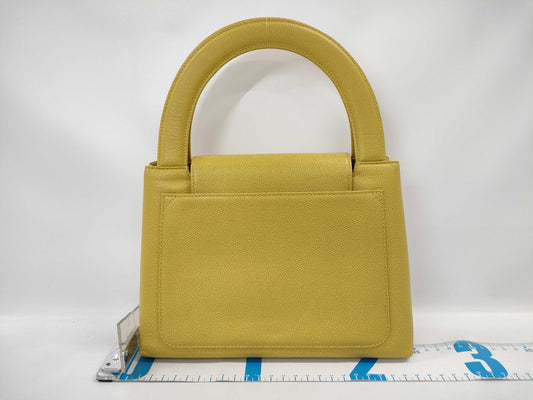 CHANEL Turnlock Caviar Yellow GP Handbag