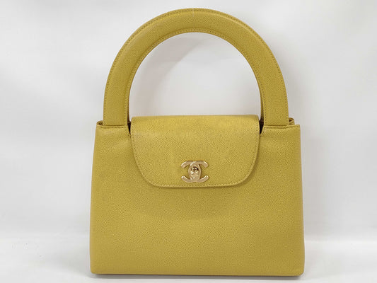 CHANEL Turnlock Caviar Yellow GP Handbag