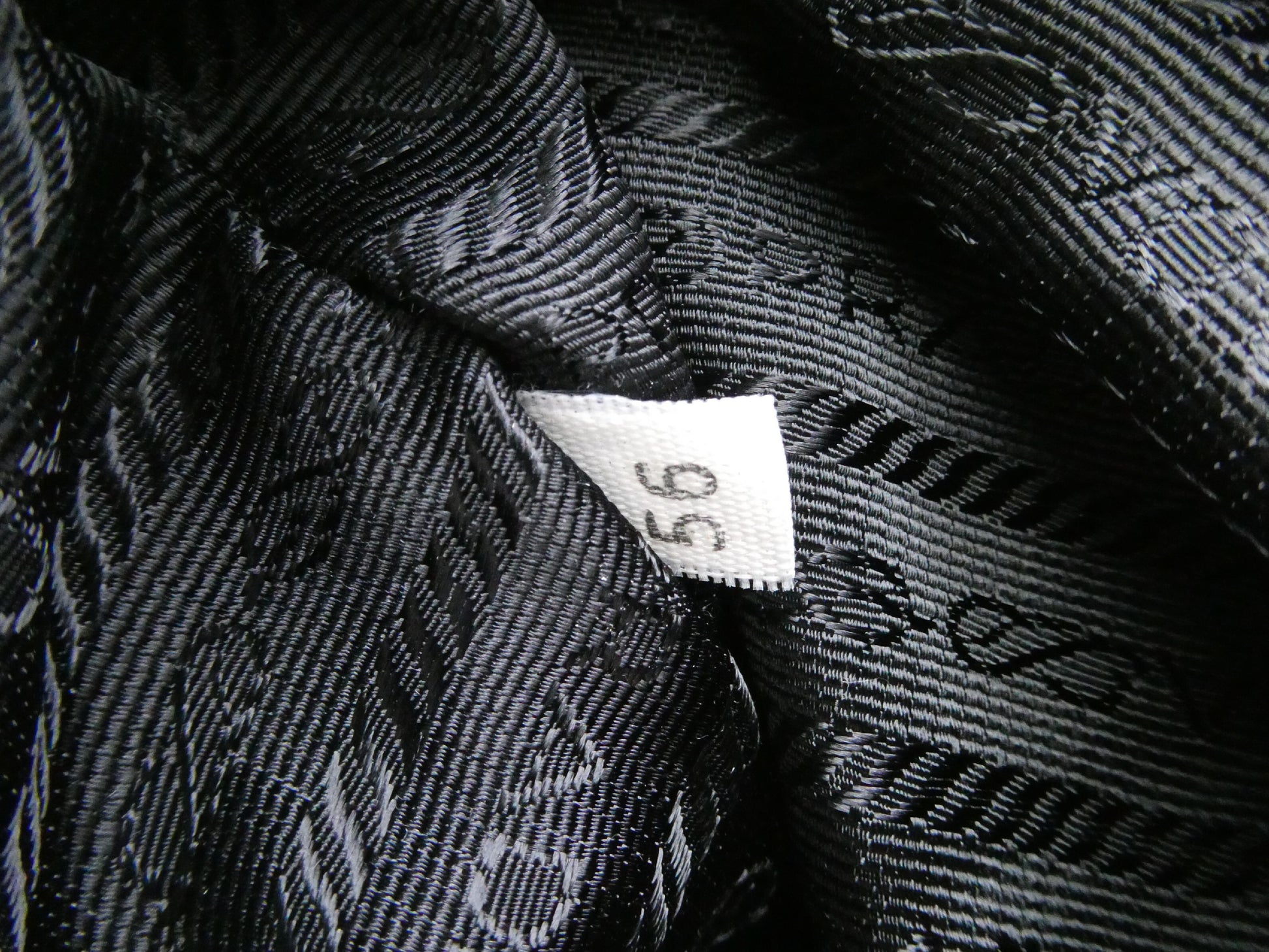 PRADA logo plate nylon and leather backpack
