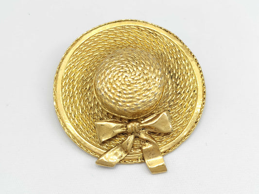 CHANEL straw hat brooch
