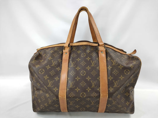 LOUIS VUITTON Monogram Sax Souple Boston Bag
