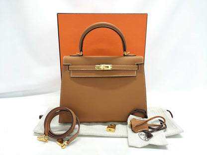 HERMES Kelly 25 Shoulder Bag with Gold Hardware and External Stitching, Brown