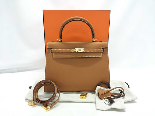 HERMES Kelly 25 Shoulder Bag with Gold Hardware and External Stitching, Brown