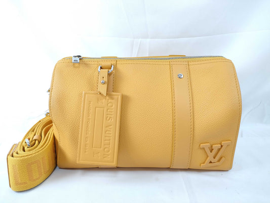 LOUIS VUITTON RFID Verified, Serial Number Unverifiable, Epi Louis Vuitton City Keepall Handbag