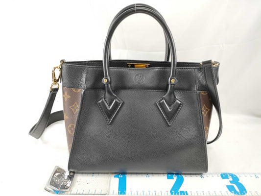 LOUIS VUITTON RFID Verified, Serial Number Unverified LOUIS VUITTON On My Side PM Handbag