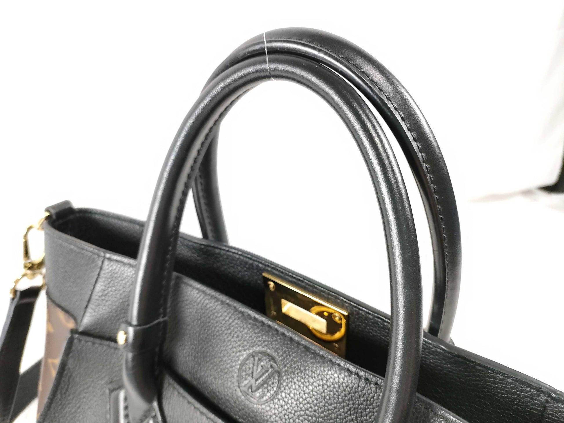 LOUIS VUITTON RFID Verified, Serial Number Unverified LOUIS VUITTON On My Side PM Handbag