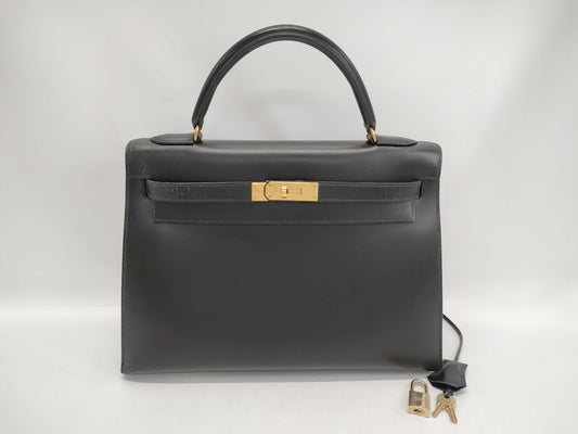 HERMES Kelly 32 Handbag, Black Calfskin, Gold Hardware, 〇U Stamp
