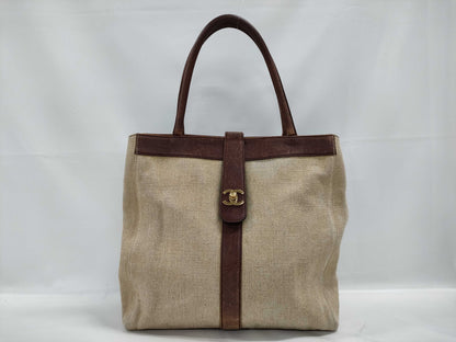 CHANEL Canvas Turnlock Brown Tote Bag