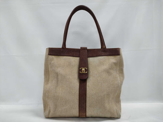 CHANEL Canvas Turnlock Brown Tote Bag