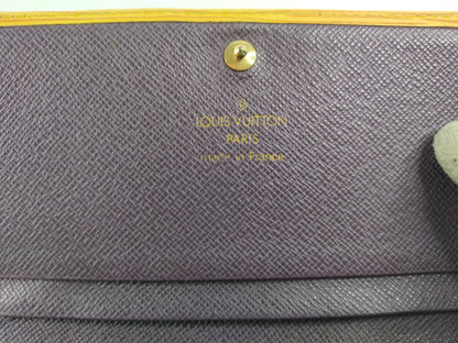 LOUIS VUITTON [Serial Number] SR0082 Epi Leather Bifold Wallet in Yellow