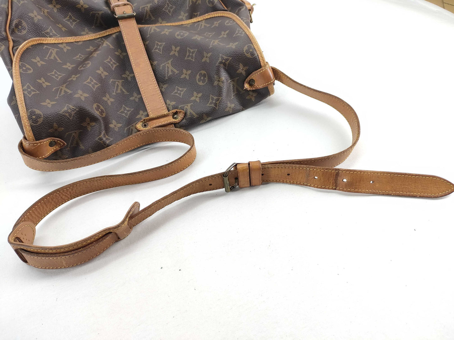 LOUIS VUITTON RFID verification failed. AR0990 Monogram Saumur Shoulder Bag.