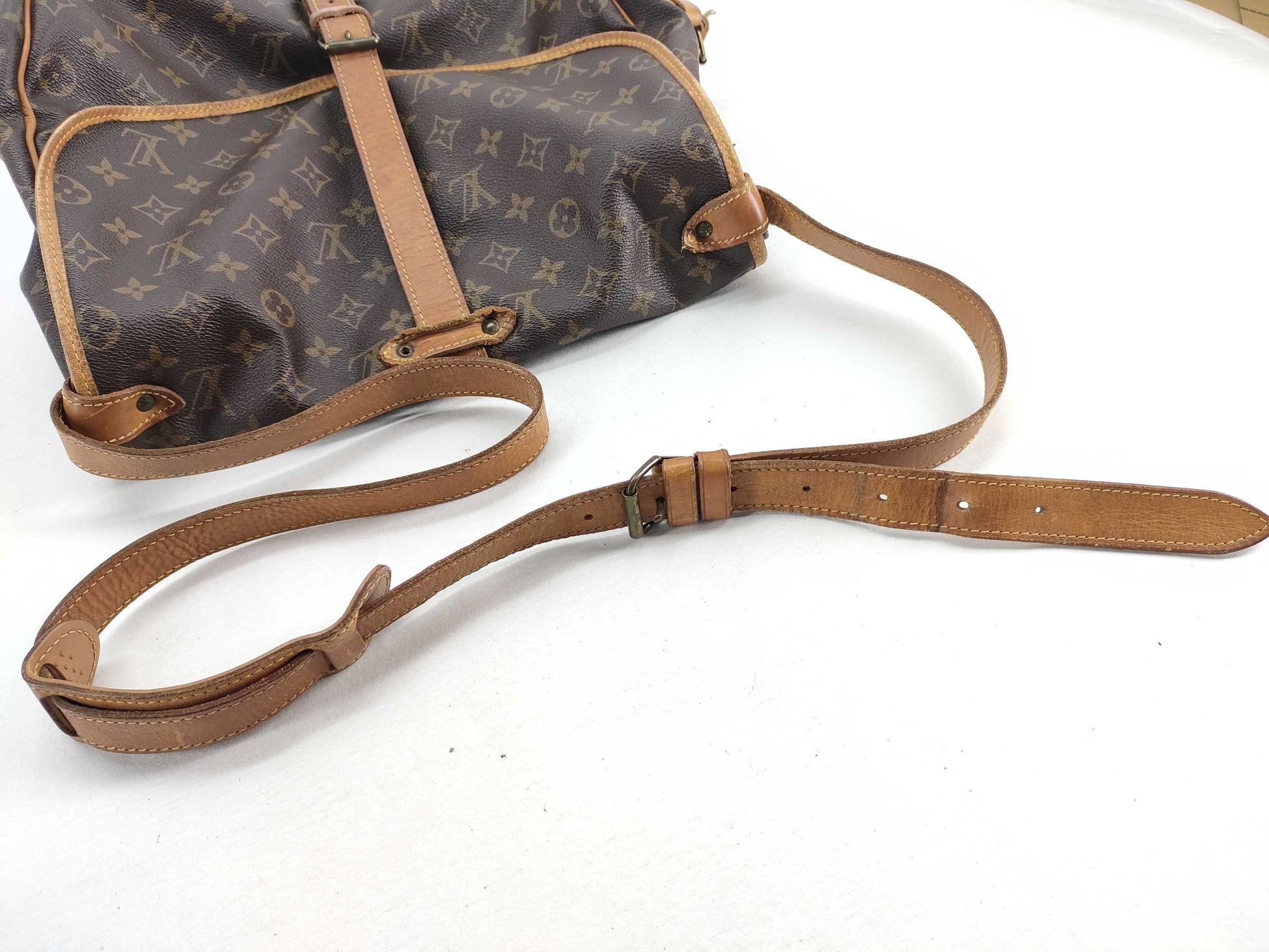 LOUIS VUITTON RFID verification failed. AR0990 Monogram Saumur Shoulder Bag.