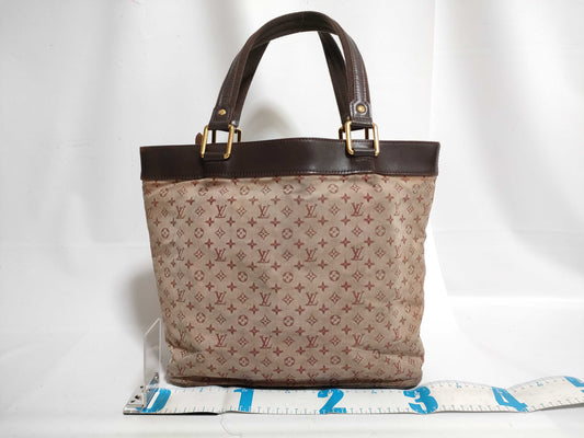 LOUIS VUITTON Monogram Mini Louis Vuitton Monogram Mini Lucille Handbag