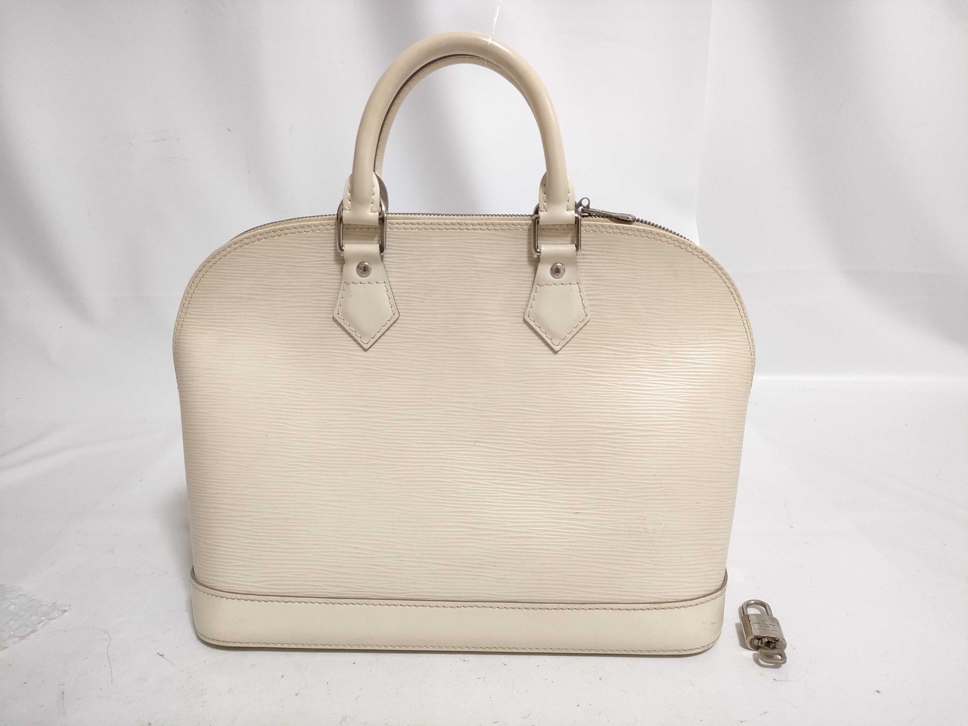LOUIS VUITTON Epi Louis Vuitton Epi Alma Handbag