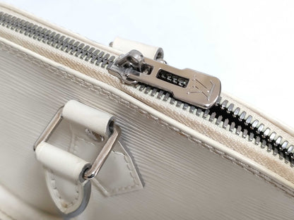 LOUIS VUITTON Epi Louis Vuitton Epi Alma Handbag