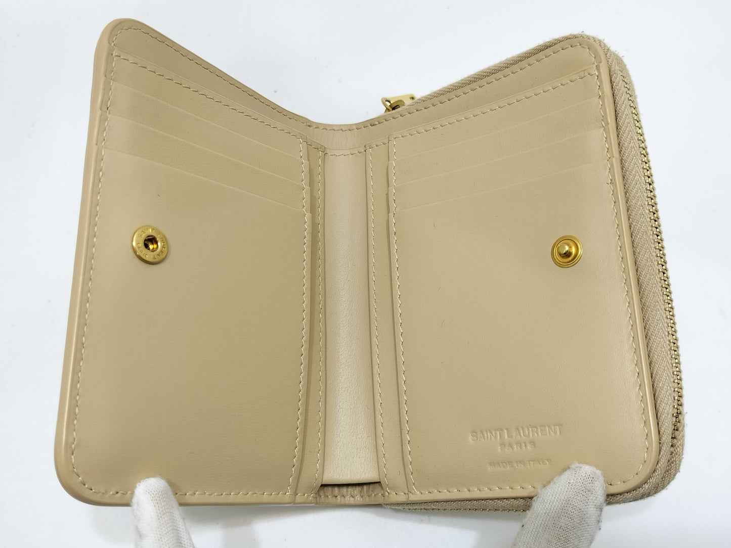 Yves Saint Laurent Paris Logo Bifold Wallet in Beige Leather