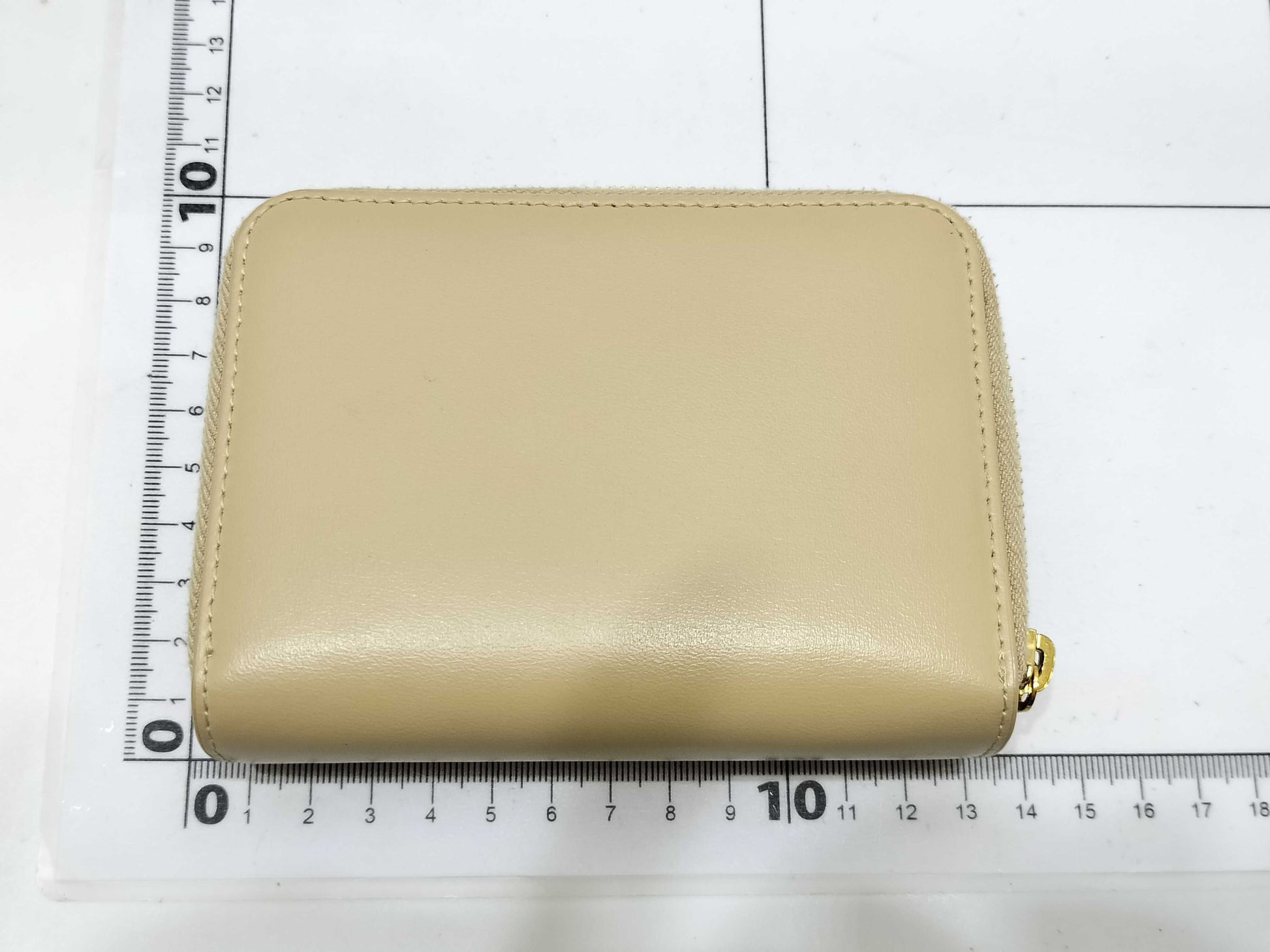 Yves Saint Laurent Paris Logo Bifold Wallet in Beige Leather