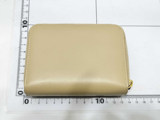 Yves Saint Laurent Paris Logo Bifold Wallet in Beige Leather