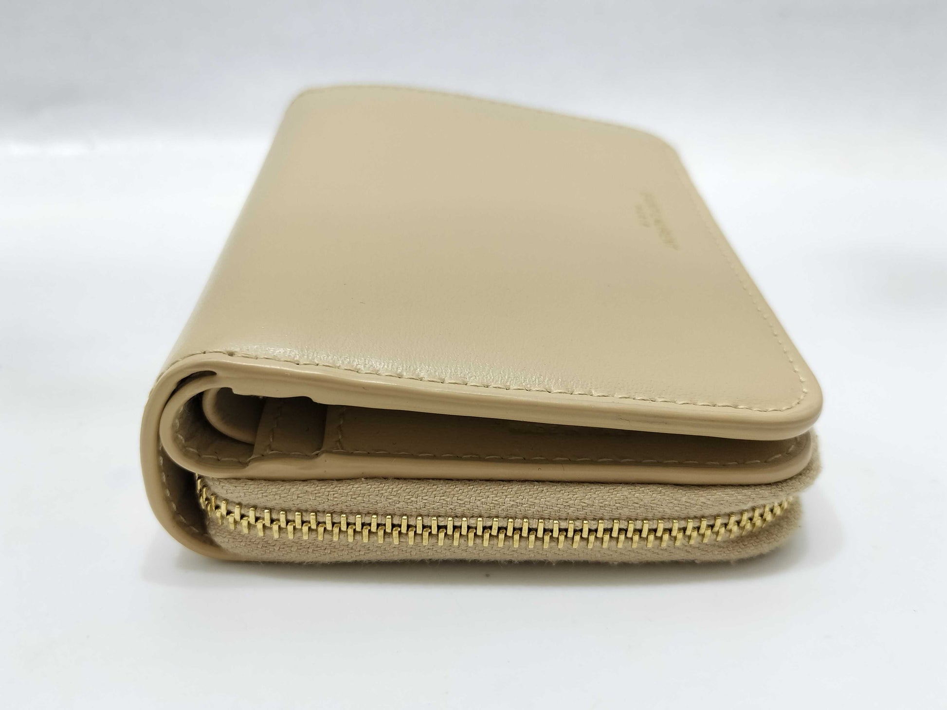 Yves Saint Laurent Paris Logo Bifold Wallet in Beige Leather