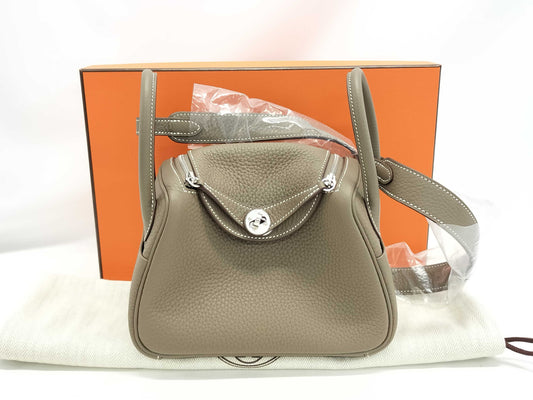 HERMES Lindy Mini Handbag in Taurillon Clemence Etoupe Leather with Silver Hardware and K Stamp