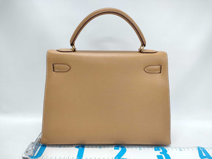 HERMES Kelly 32 Couchvel Natural Y〇 Stamp Accessories: Shoulder strap, padlock, clochette, dust bag Handbag