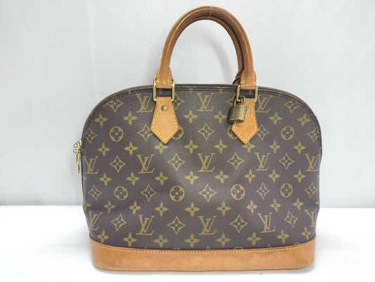 LOUIS VUITTON Monogram Louis Vuitton Monogram Alma Handbag