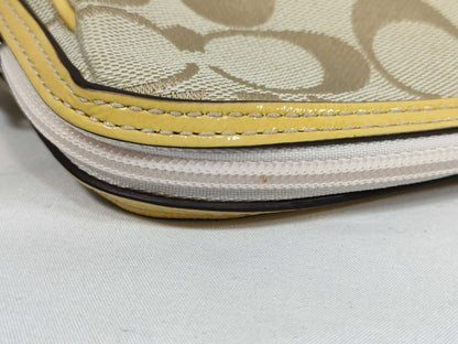 COACH 3-piece pouch set
