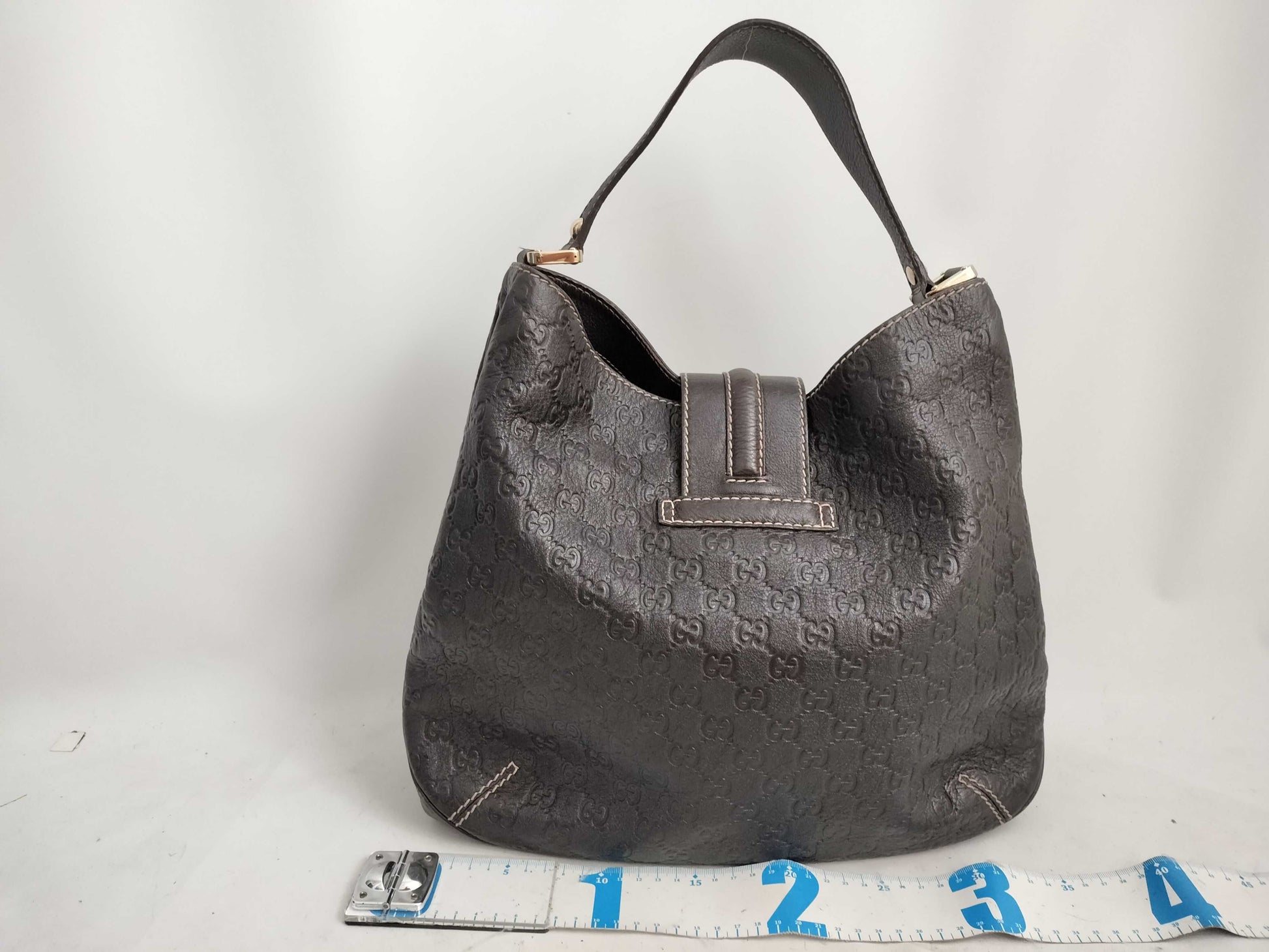GUCCI Guccissima Leather Shoulder Bag with GG Pattern and Logo 233604
