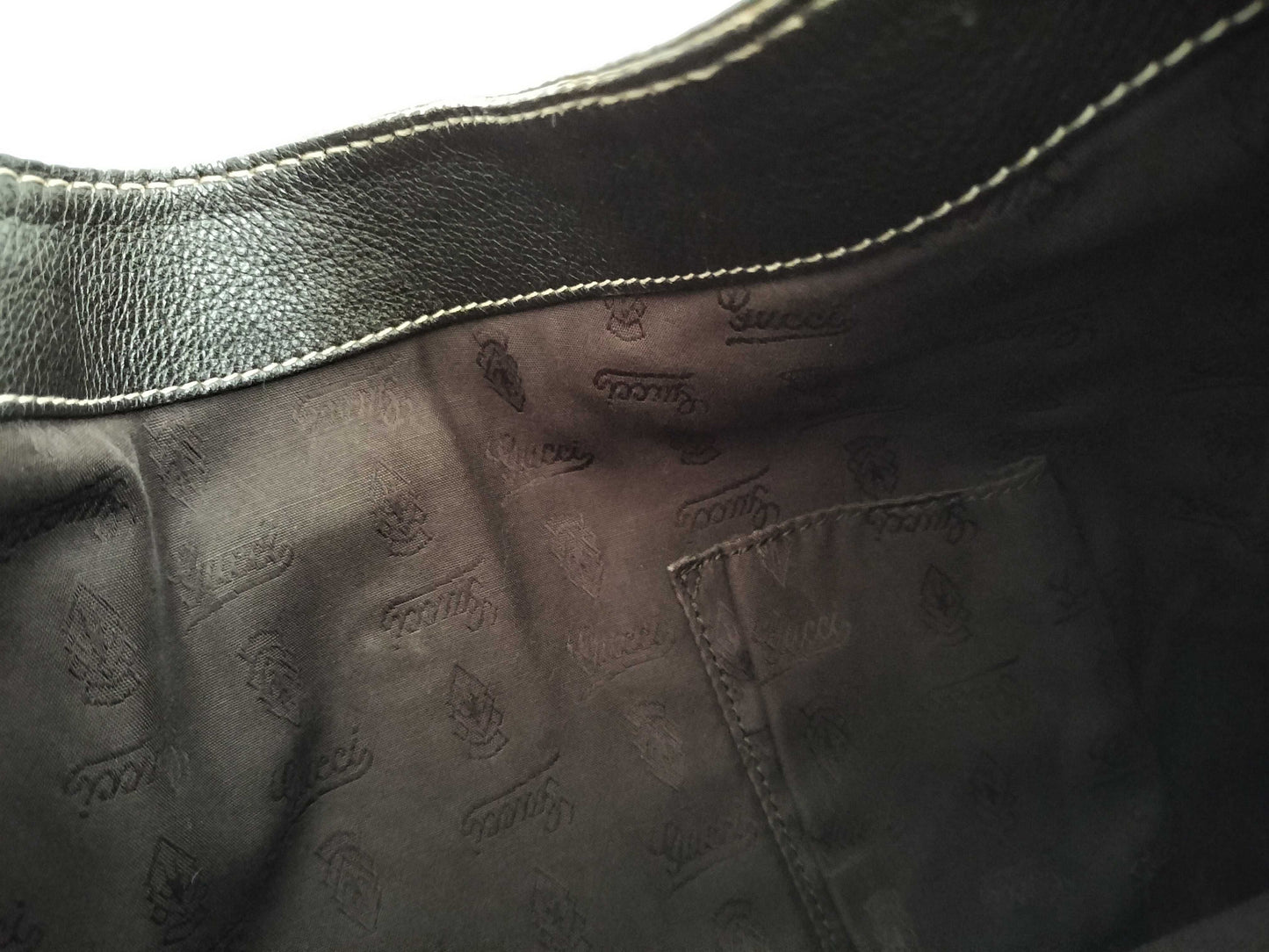 GUCCI Guccissima Leather Shoulder Bag with GG Pattern and Logo 233604